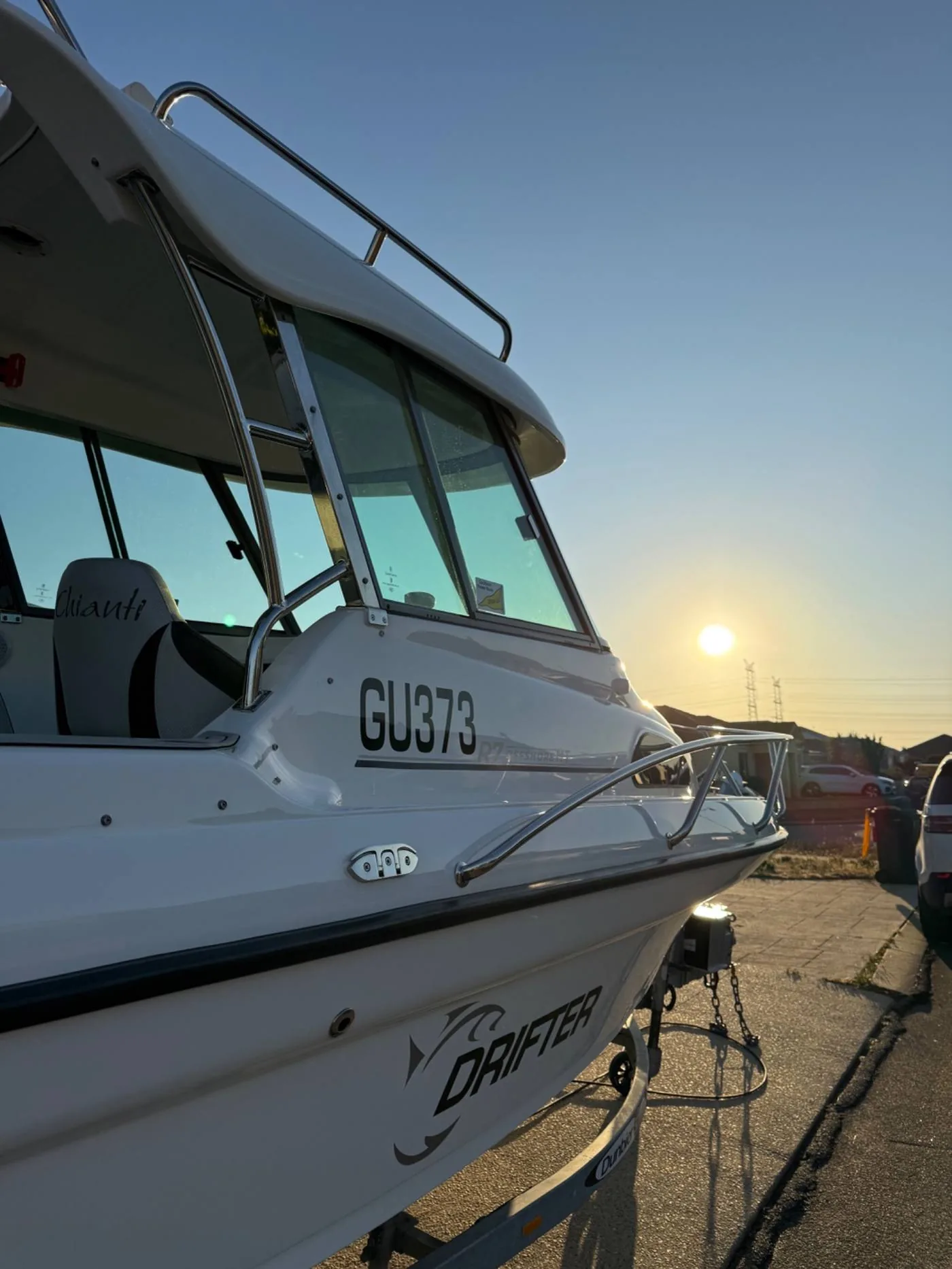Drifter boat detailing Perth — sunset detail shot on water